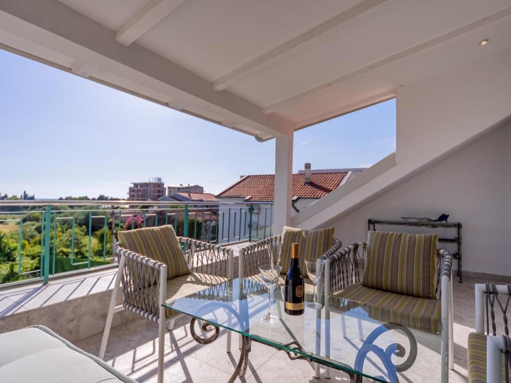 Private balcony with a green view