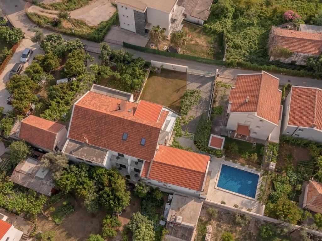 Aerial view of Vila Gina and its pool